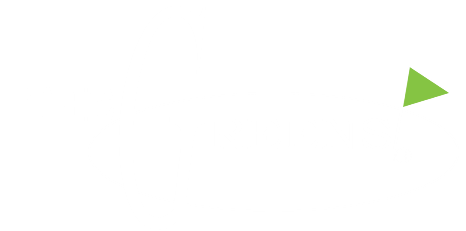 a green envelope sitting on top of a wooden table