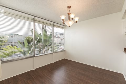 Dining Room with Hardwood Floors and Chandelier
