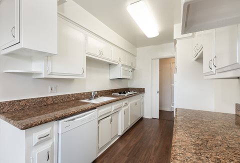 Kitchen with White Appliances and White Cabinets