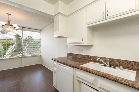 Kitchen with White Appliances and White Cabinets