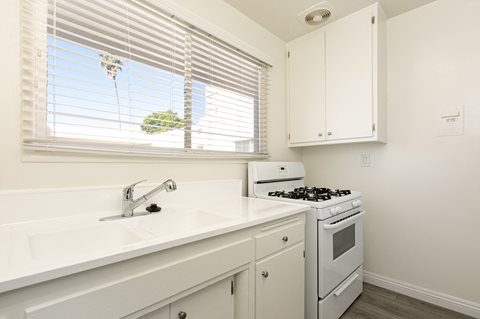 Kitchen with White Appliances and White Cabinets