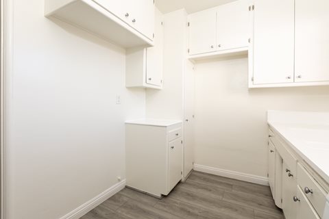 Kitchen with White Appliances and White Cabinets