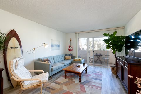 Living Room with Hardwood Floors and Patio Doors