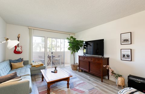 Living Room with Hardwood Floors and Patio Doors
