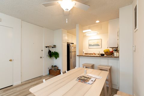 Dining Room with Hardwood Floors and Fan