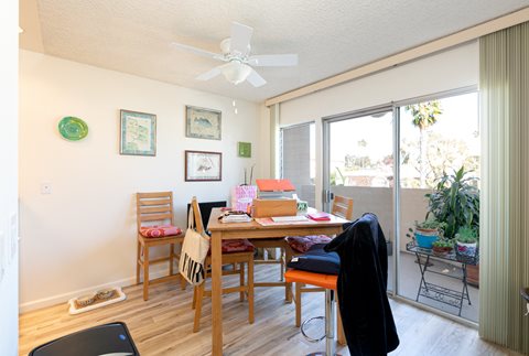 Dining Room with Hardwood Floors and Fan