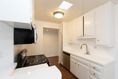 Kitchen with Stainless Steel Appliances and White Cabinets
