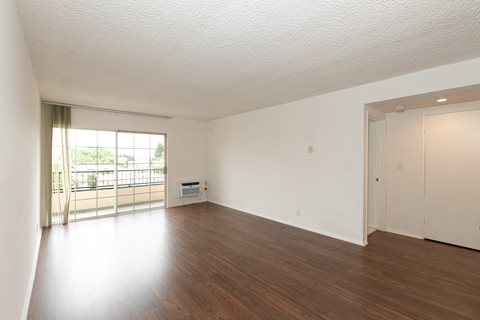 Living Room with Hardwood Floors and Patio Doors