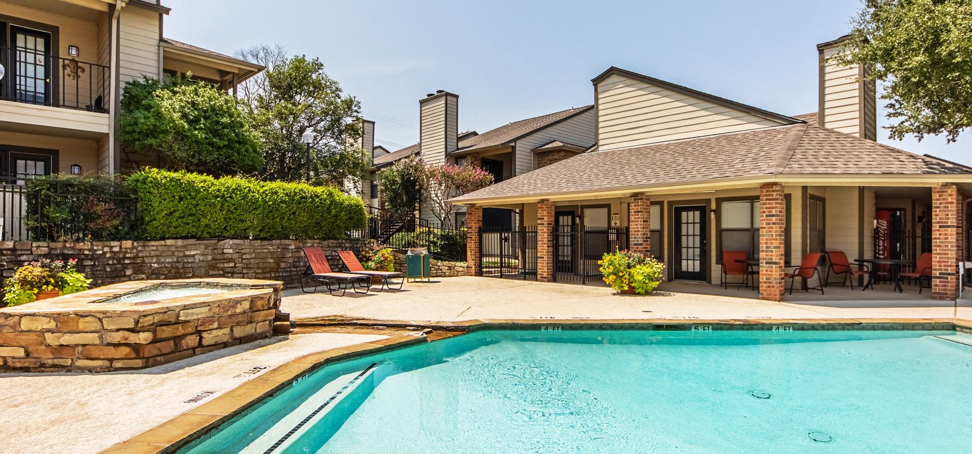 Swimming Pool at Woodmeade Apartments in Irving, Texas, TX
