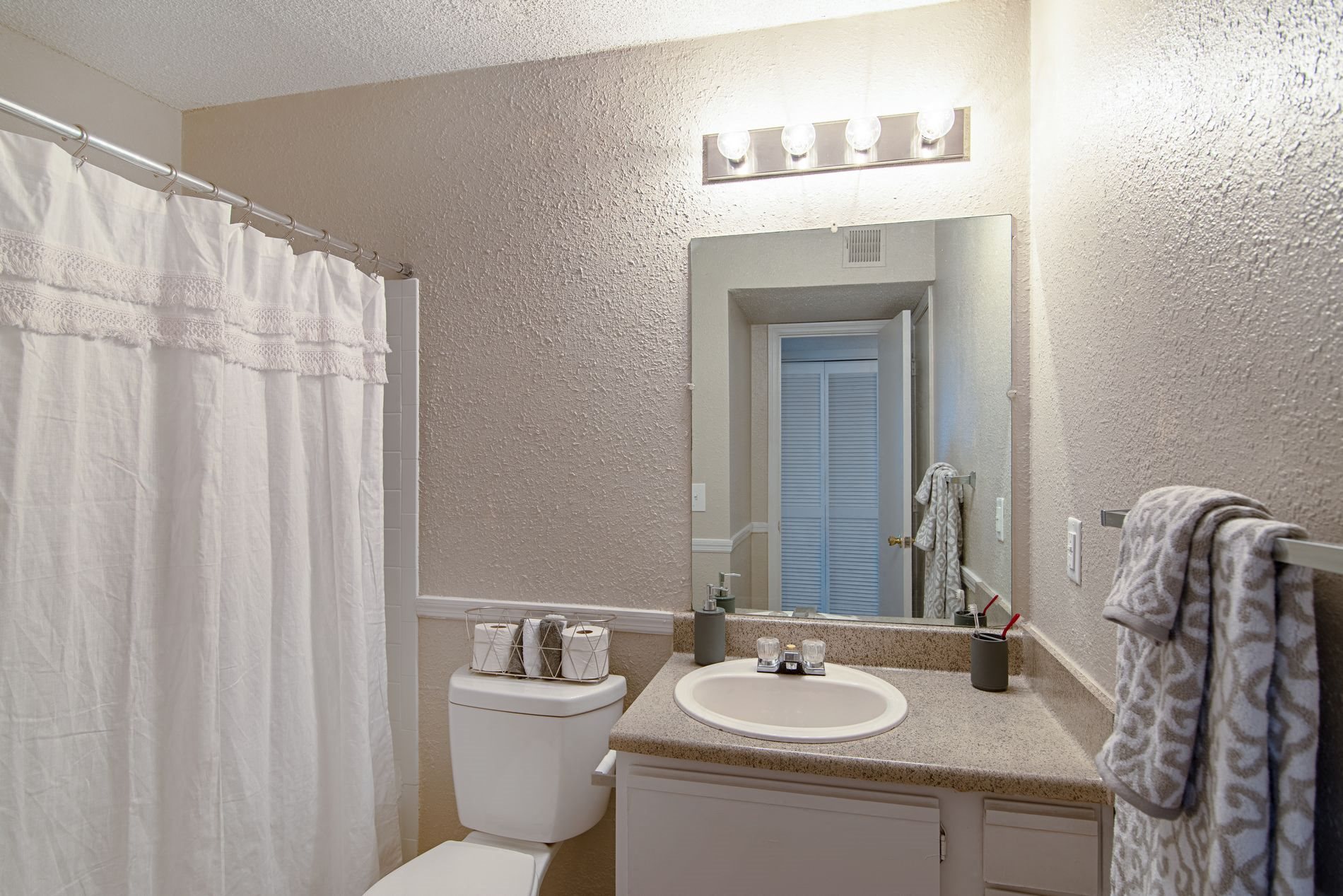 Model Bathroomat Woodmere Trace Apartments in Duluth, Georgia, GA 30096
