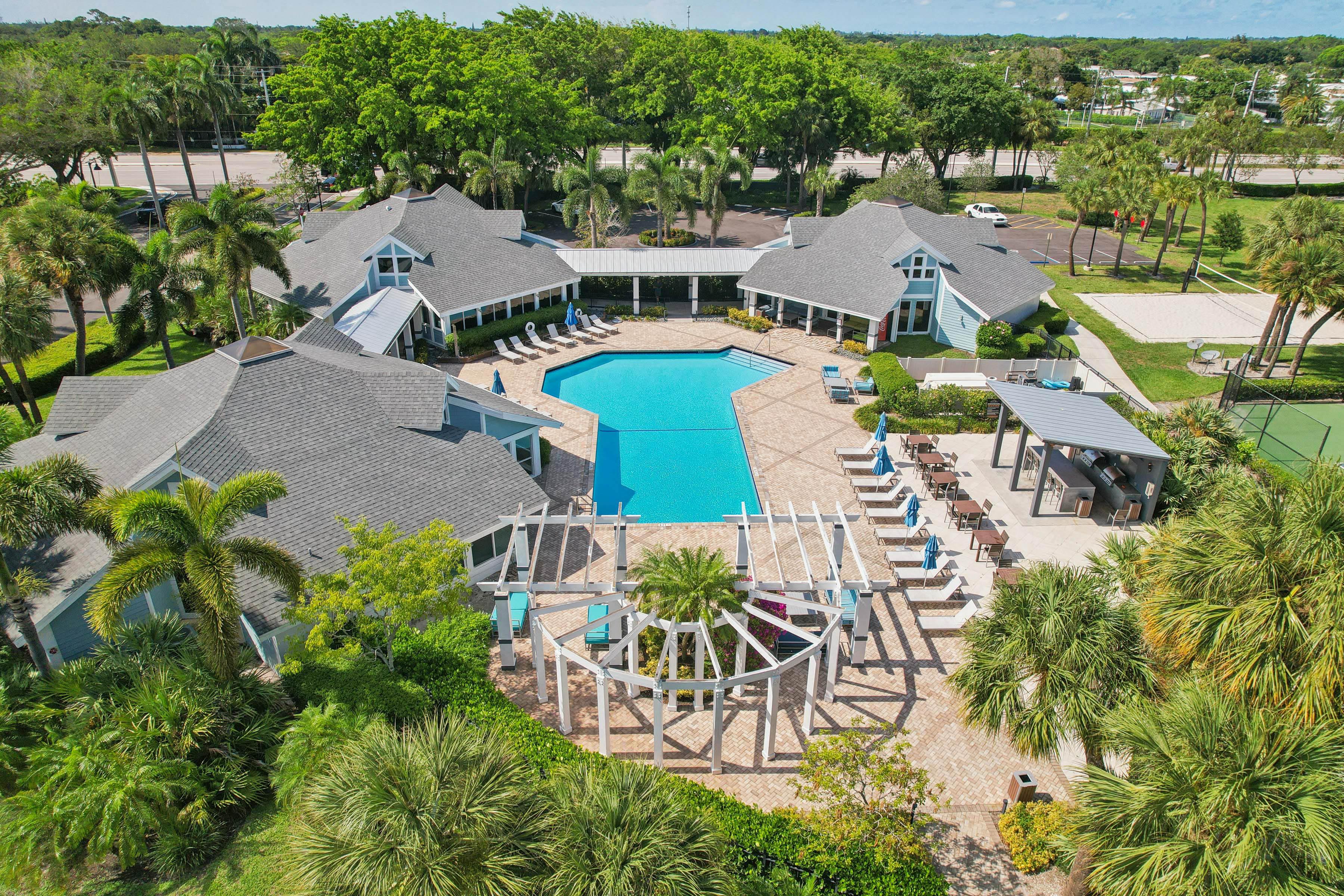 a aerial view of the resort with a swimming pool at The Villages Apartment of Banyan Grove Apartments for rent in Boynton Beach FL