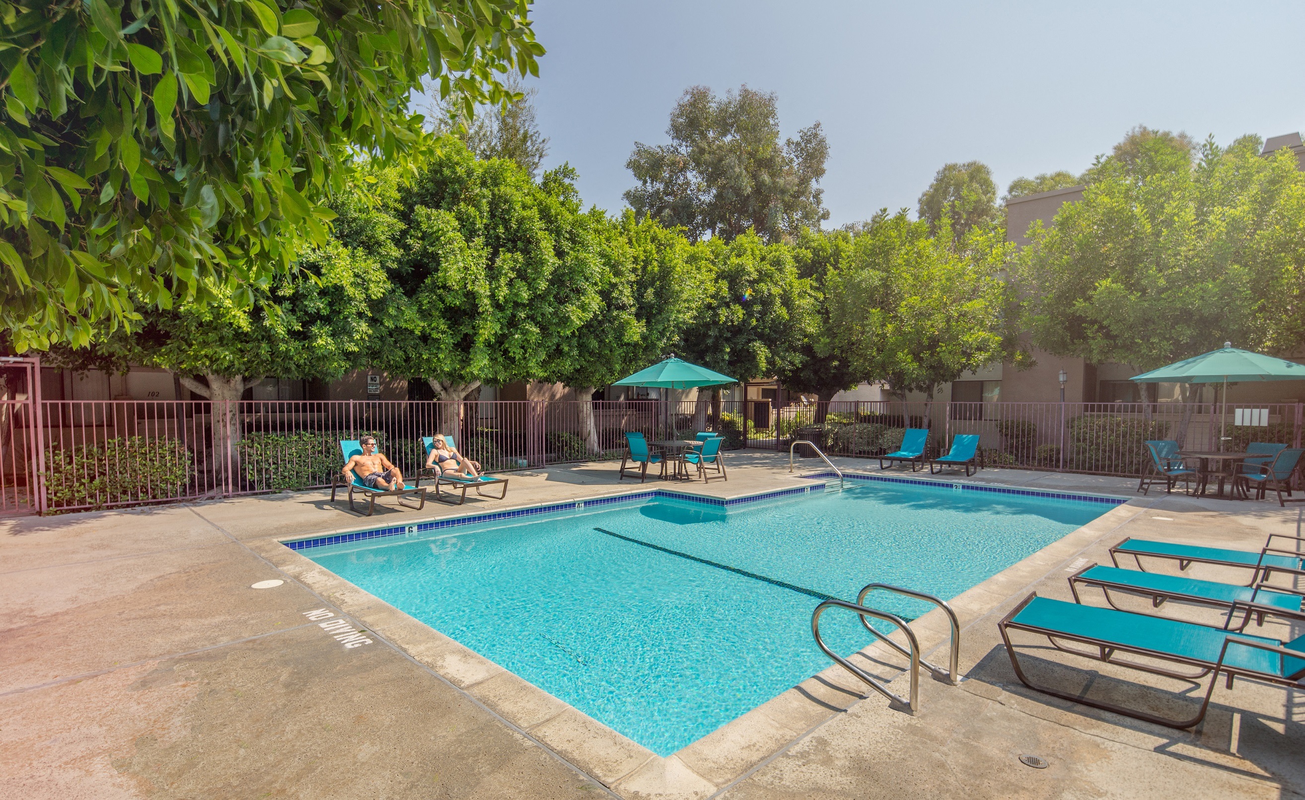 Canoga-Park-NMS-West-Hills-Luxury-Apartment-West-Hills-Exterior-Pool-Couple