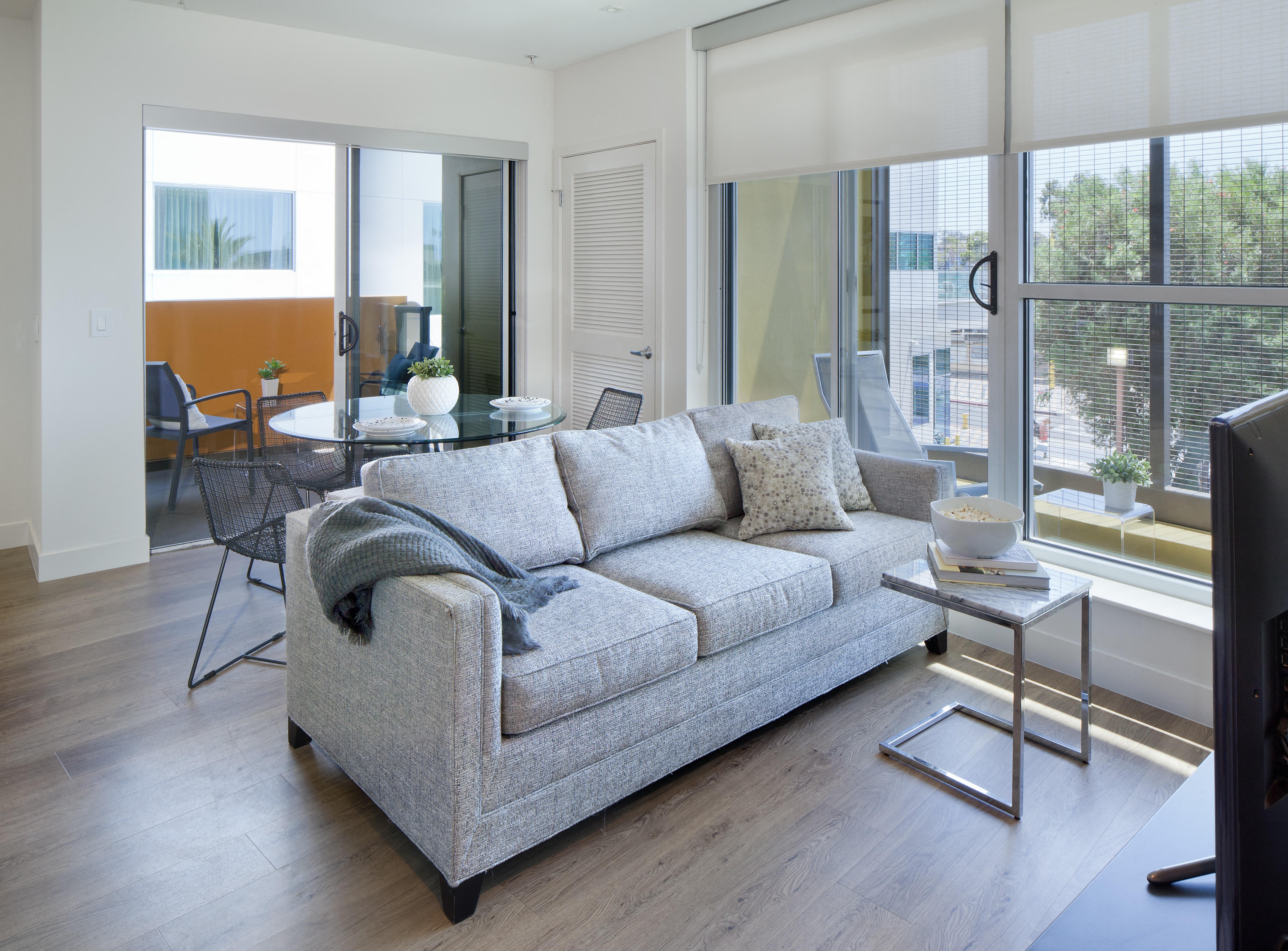 a kitchen and dining area in a 555 waverly unit