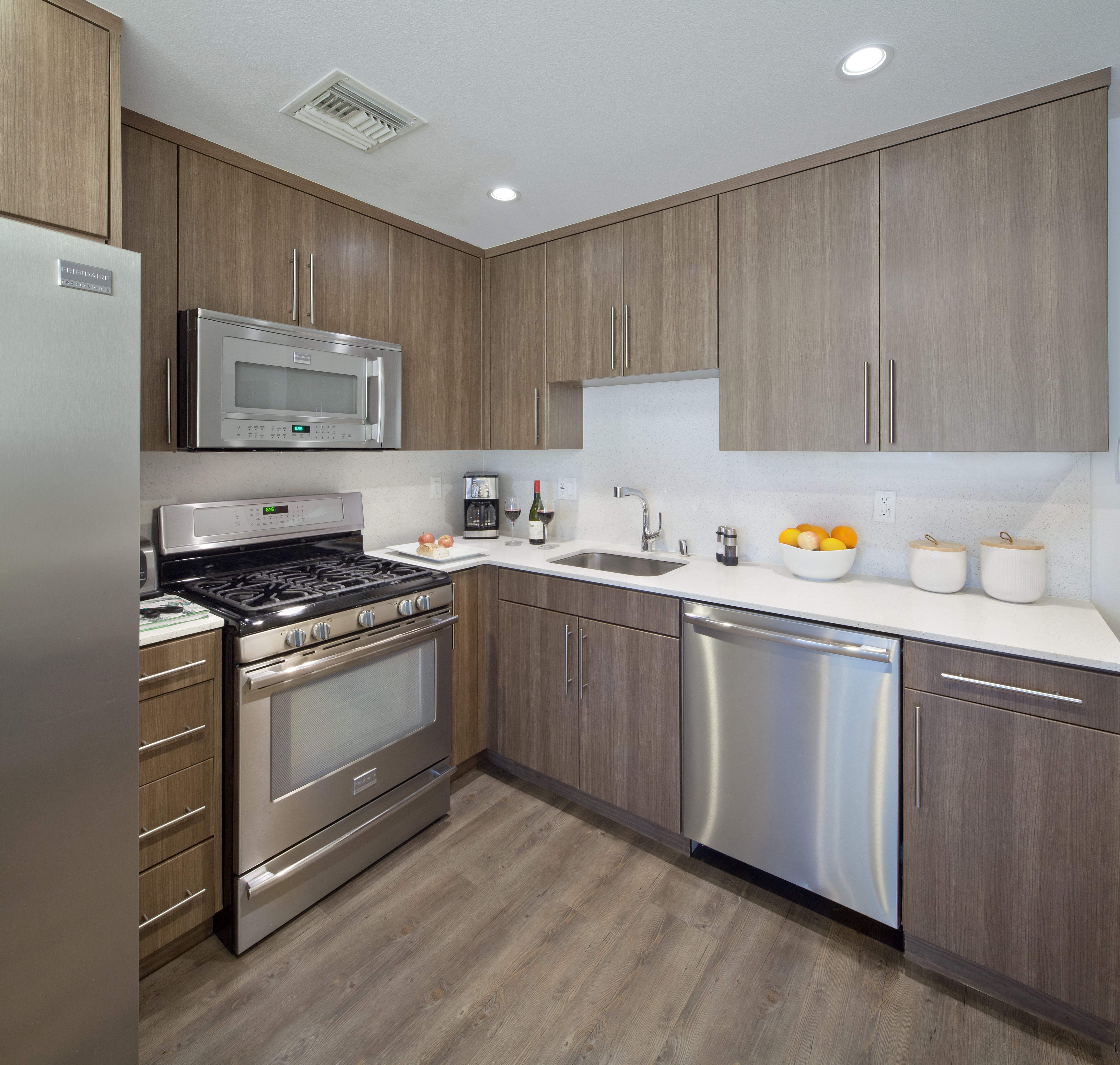 a modern kitchen with stainless steel appliances
