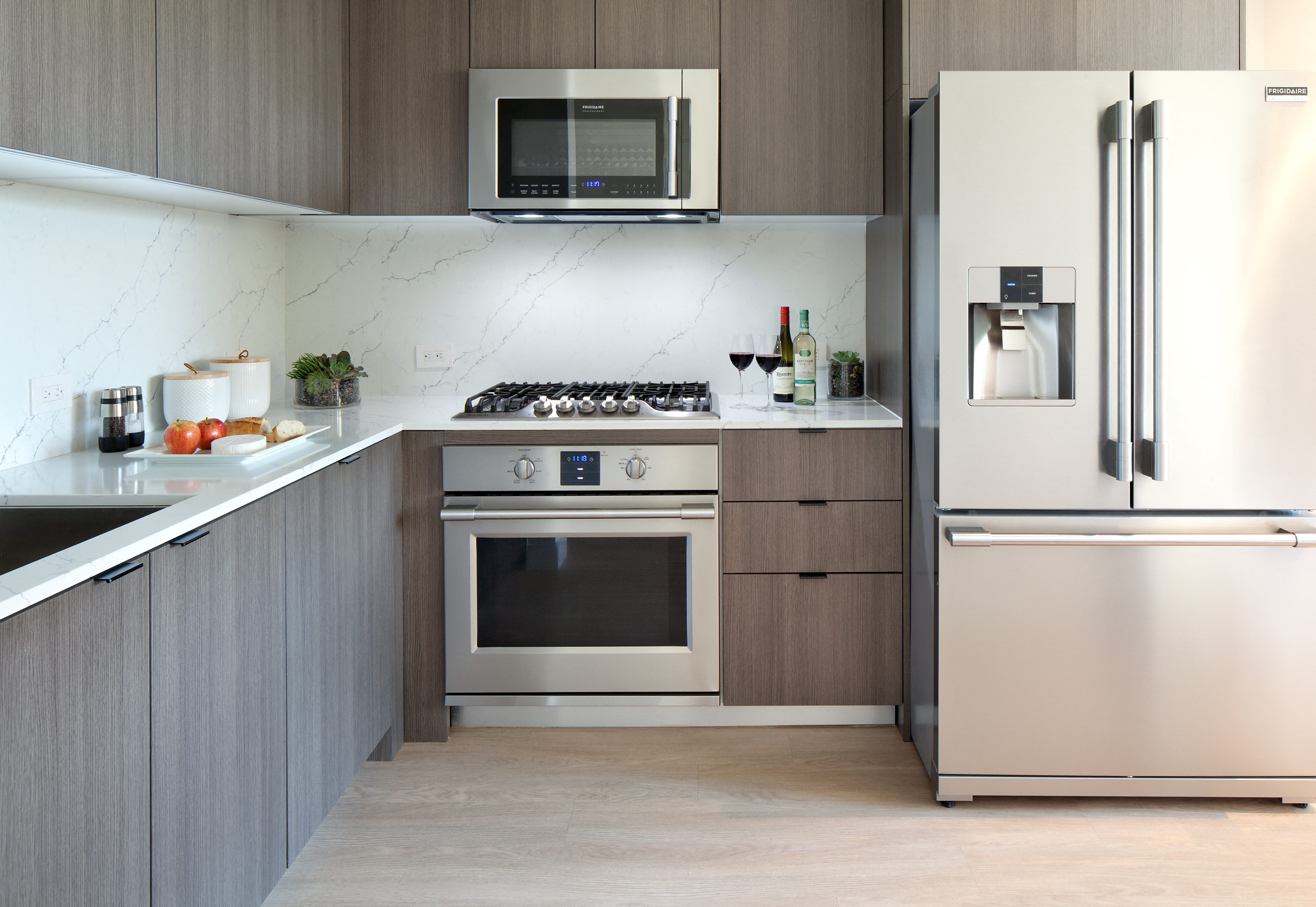 a modern kitchen with stainless steel appliances
