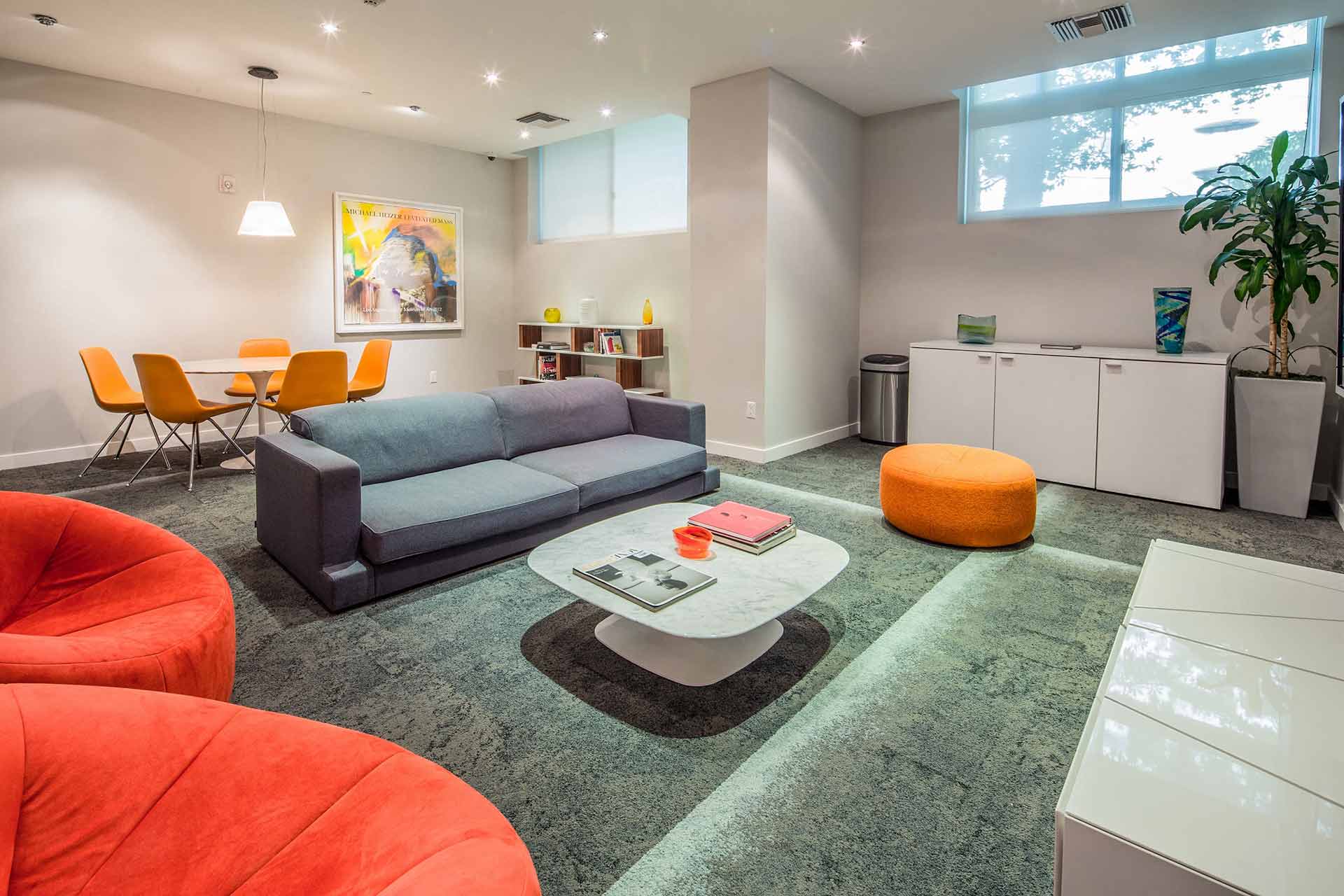 Westwood luxury apartments NMS Wilshire Margot  Dining Plus Living Room at Wilshire Margot, Los Angeles, CA Resident Media Lounge