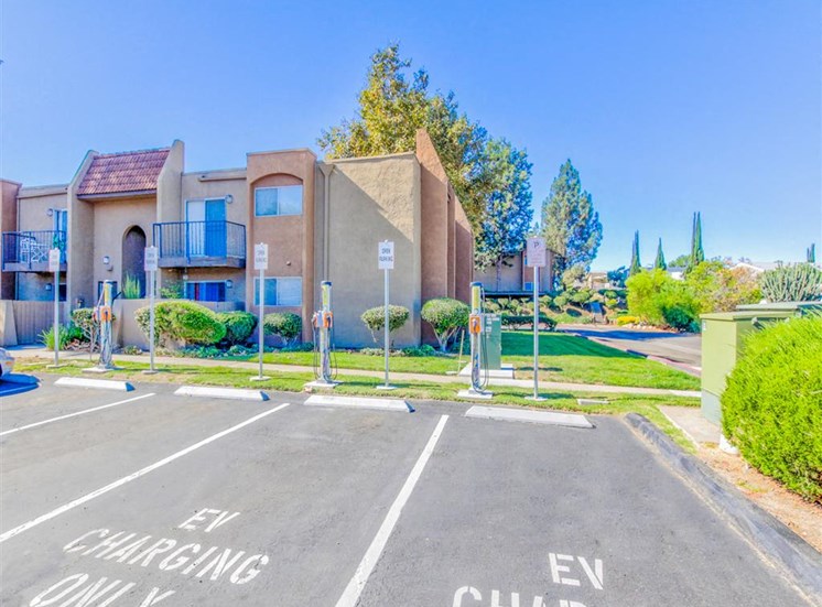 EV Charging parking at Woodlake Apartments in Escondido, CA, For Rent. Now leasing Studio, 1 and 2 bedroom apartments.