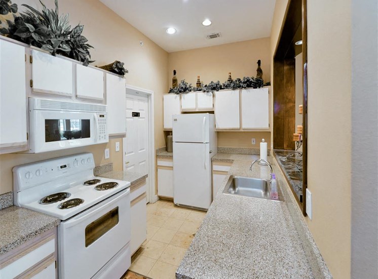 Spacious kitchen storage of Montfort Place in North Dallas, TX, For Rent. Now leasing 1 and 2 bedroom apartments.