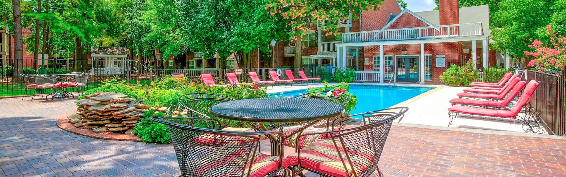 Greenbriar Apartments in Tulsa Oklahoma has a sparkling pool with lounge chairs surrounding it. Now renting 1 and 2 bedrooms!
