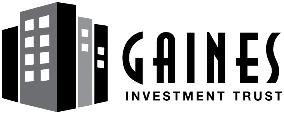 A black and white image of a building with the words "Gaines Investment Trust" written on it.