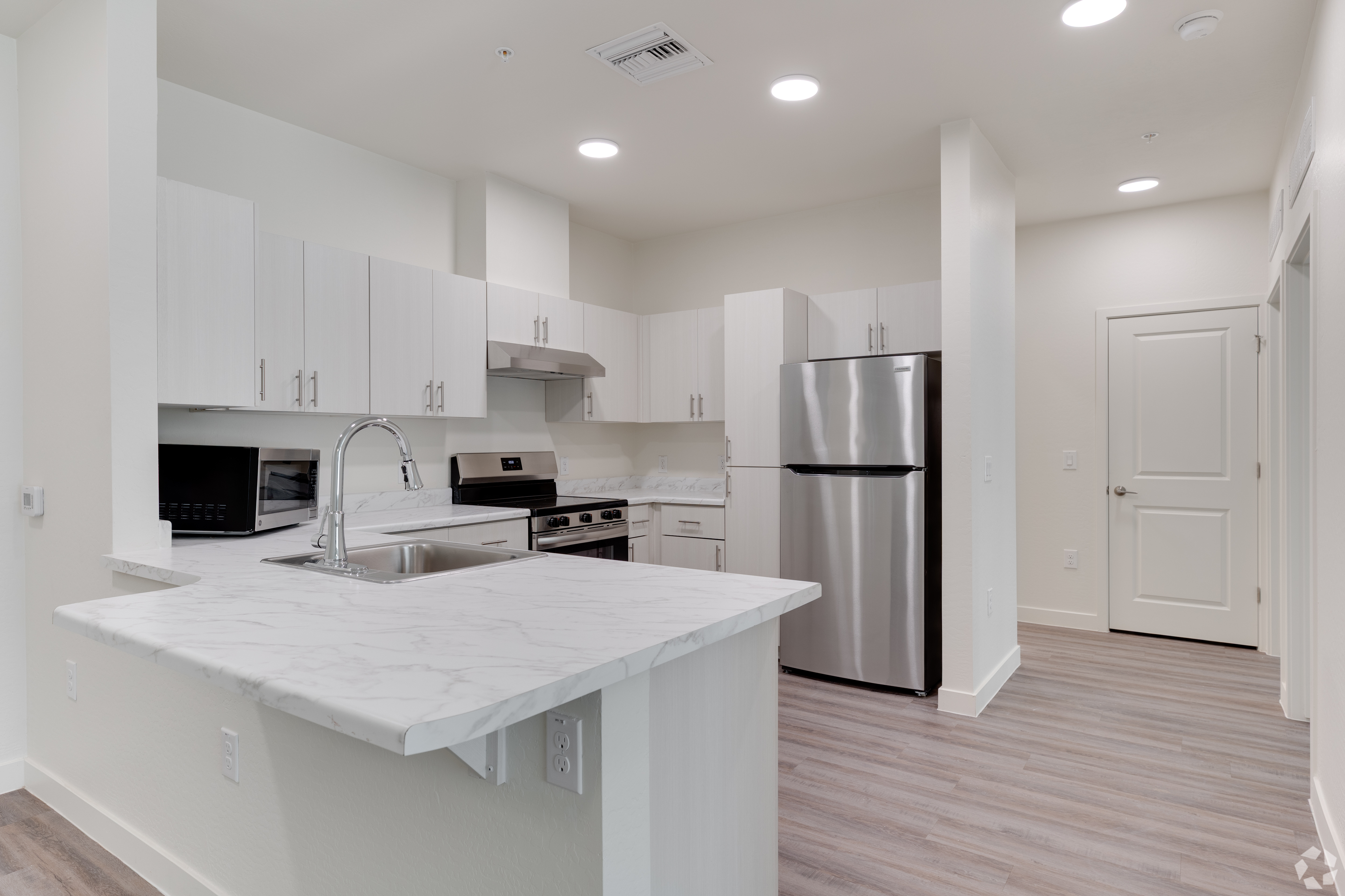 Apartment kitchen — representative home at Ascent on Broadway.