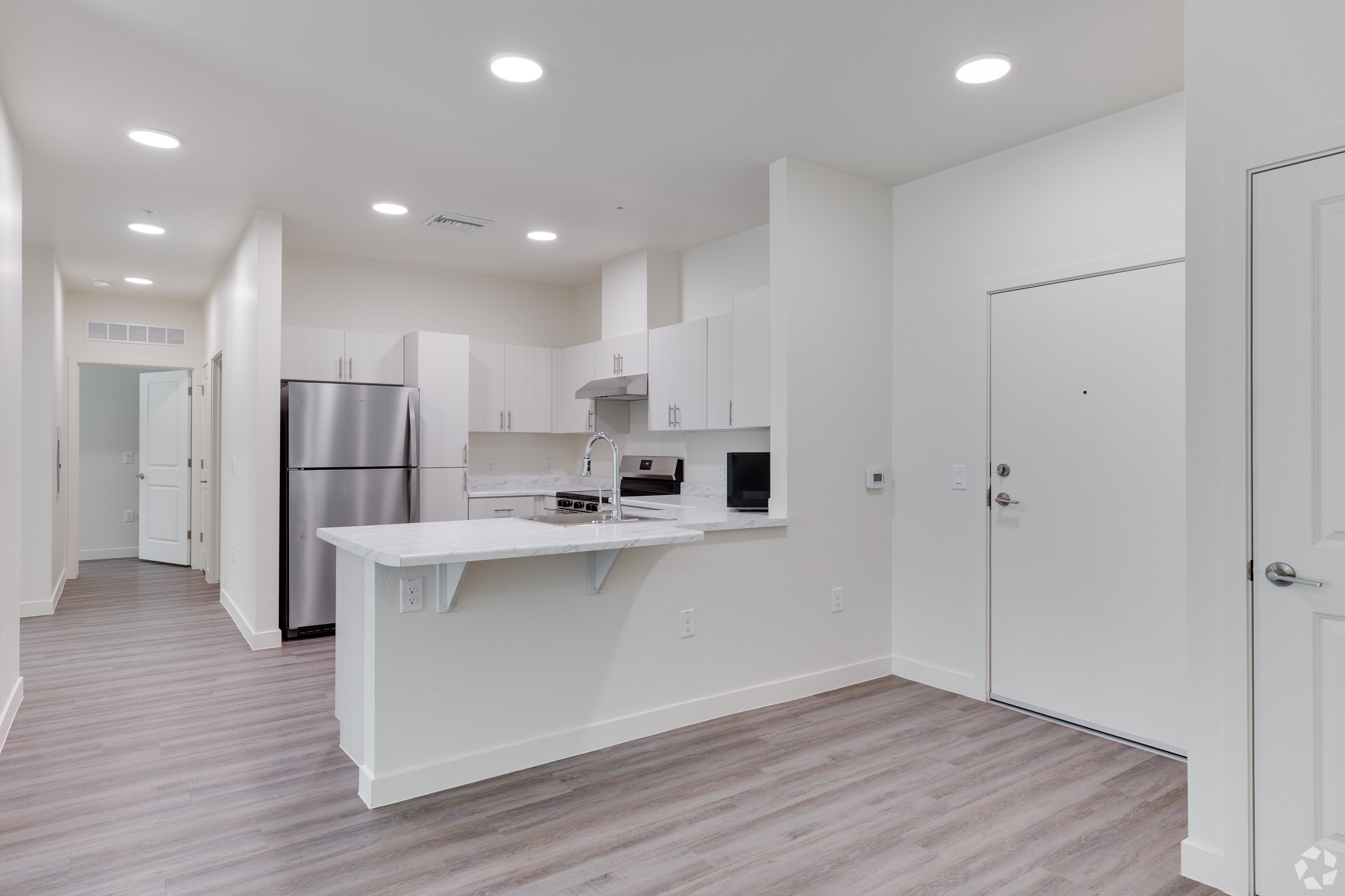 Apartment kitchen — representative home at Ascent on Broadway.