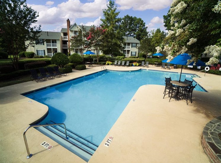 swimming pool with sundeck and pool furniture for lounging at Stillwater at Grandview Cove, Simpsonville, SC