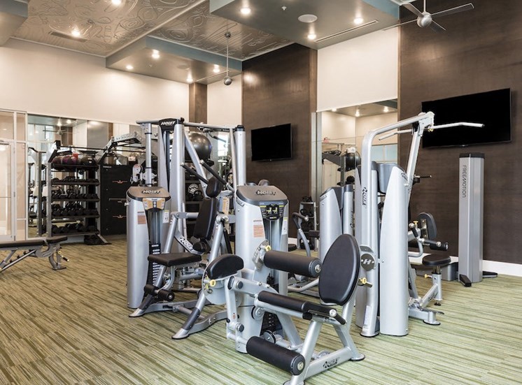 massive fitness center with strength training equipment