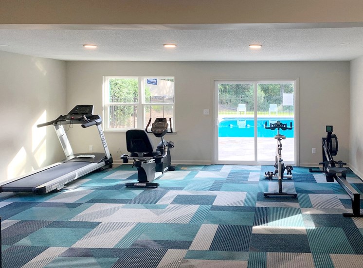Treadmill, recumbant bike, bike, and rower in fitness center