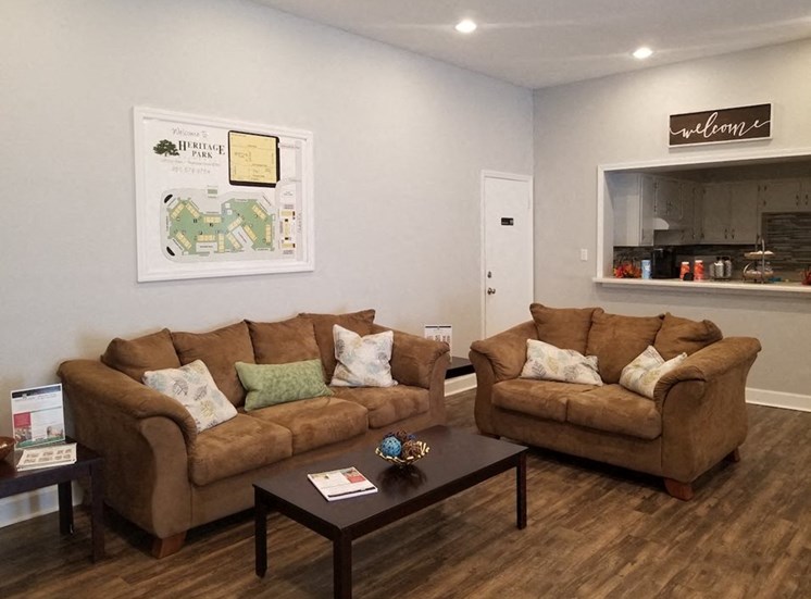 Comfortable couches and coffee table in clubhouse at Aspen Run II