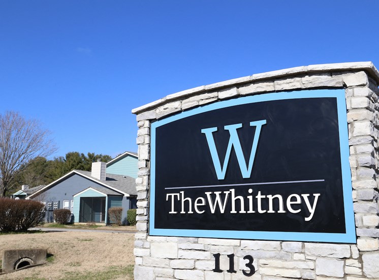 Monument sign of The Whitney Franklin outside community