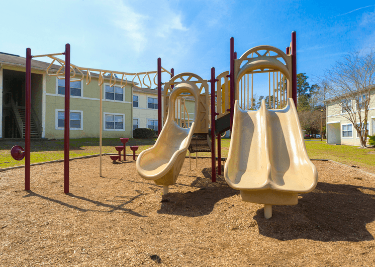 Outdoor playground area with slides