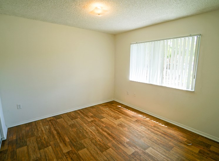 Room with Hardwood Style Flooring and Window