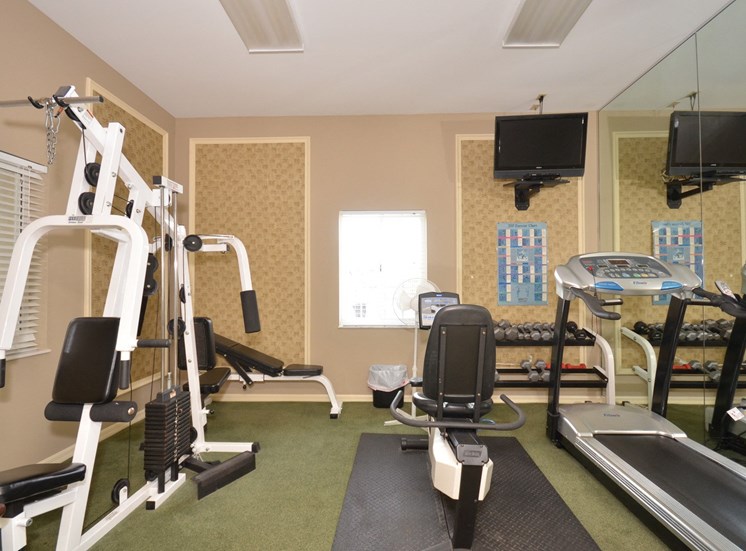 Fitness Center with Exercise Equipment at River Park Place Apartments, Vero Beach, FL