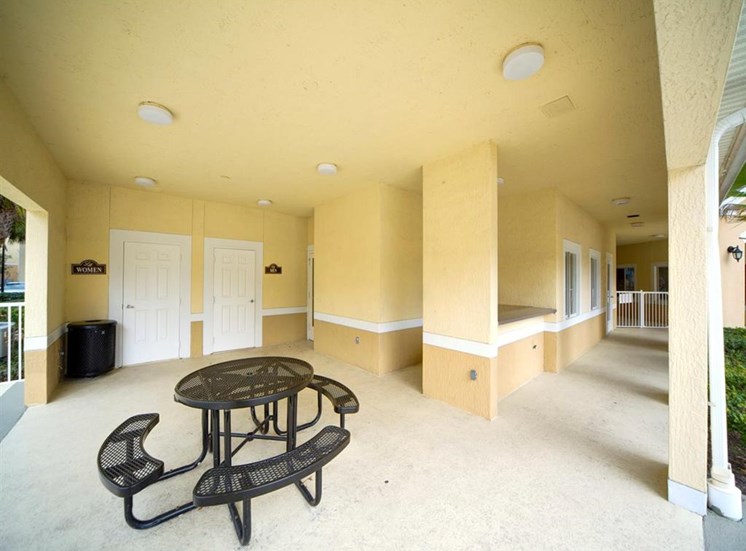 Poolside Picnic Seating at Leigh Meadows Apartments, Jacksonville, 32257