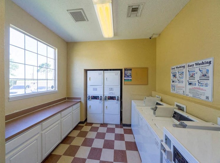 Laundry Care Center with Machines and Folding Counter
