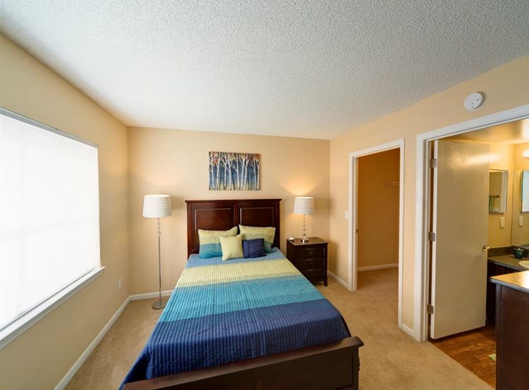 Bedroom With Expansive Windows at Holly Cove Apartments, Orange Park, 32073