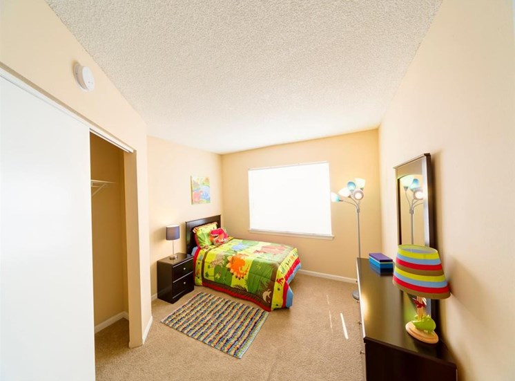 Bedroom With Carpeting at Holly Cove Apartments, Orange Park, FL