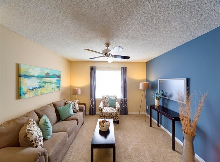 Classic Living Room Design With Television at Holly Cove Apartments, Orange Park, FL