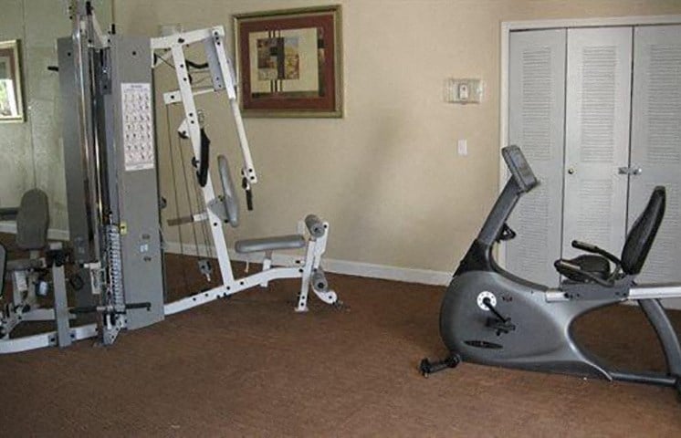 Fitness Center with Exercise Equipment and Sliding Door