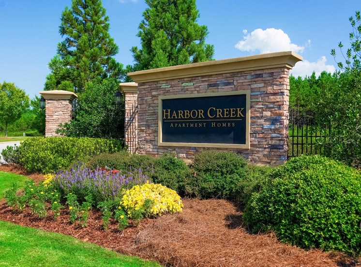 Monument Sign of property with landscaping
