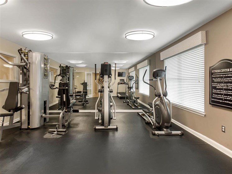 Fitness Center with Exercise Equipment  and Large Windows