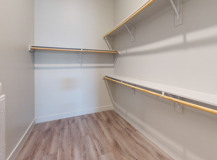 Walk in closet with shelves
