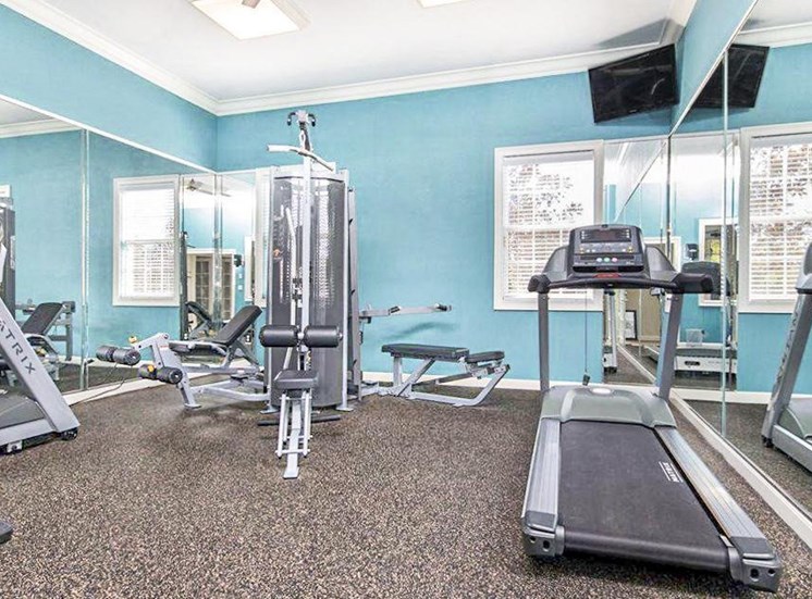 Fitness center with strength and cardio equipment.