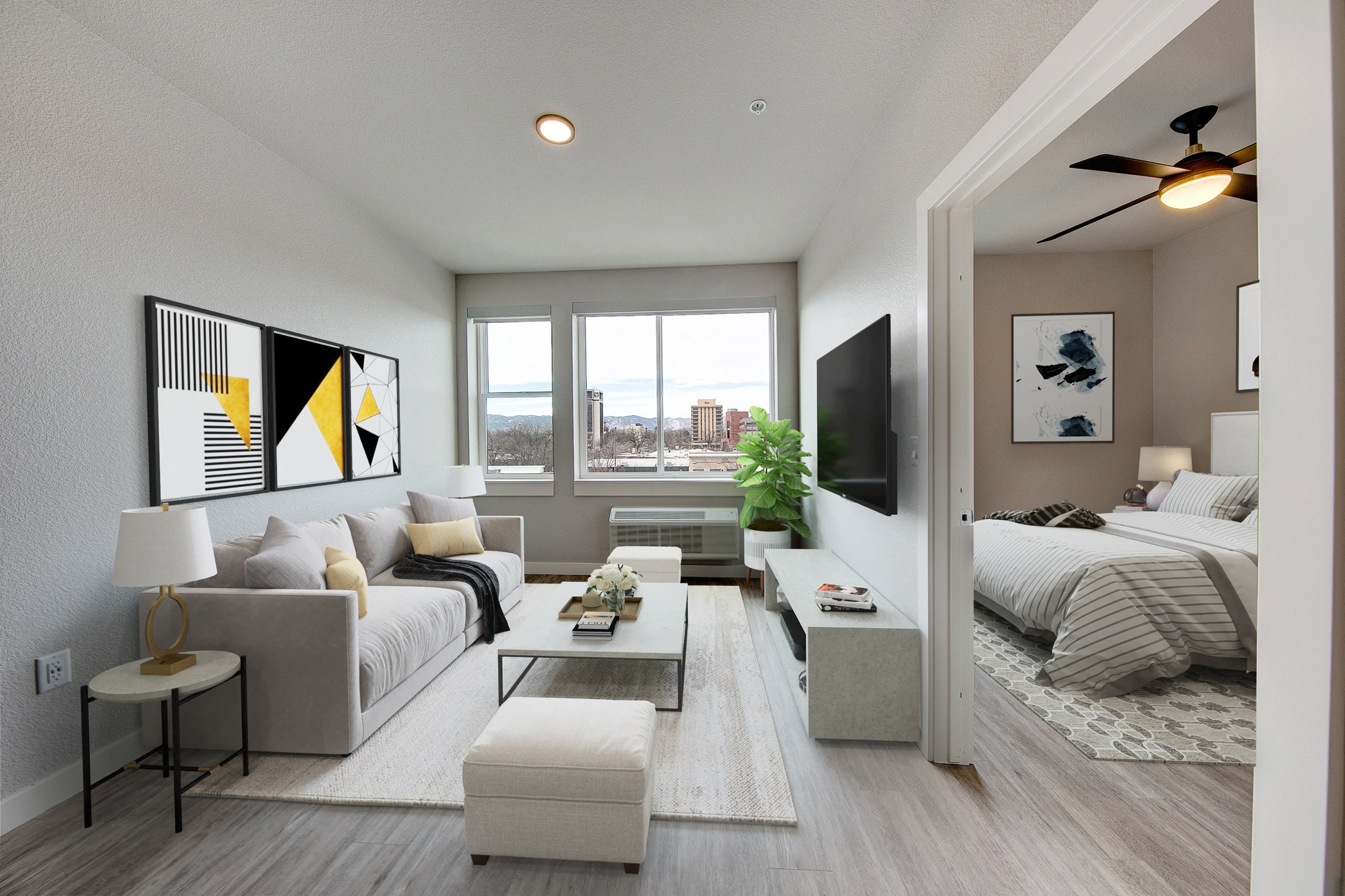 Living area and bedroom in one-bedroom apartment