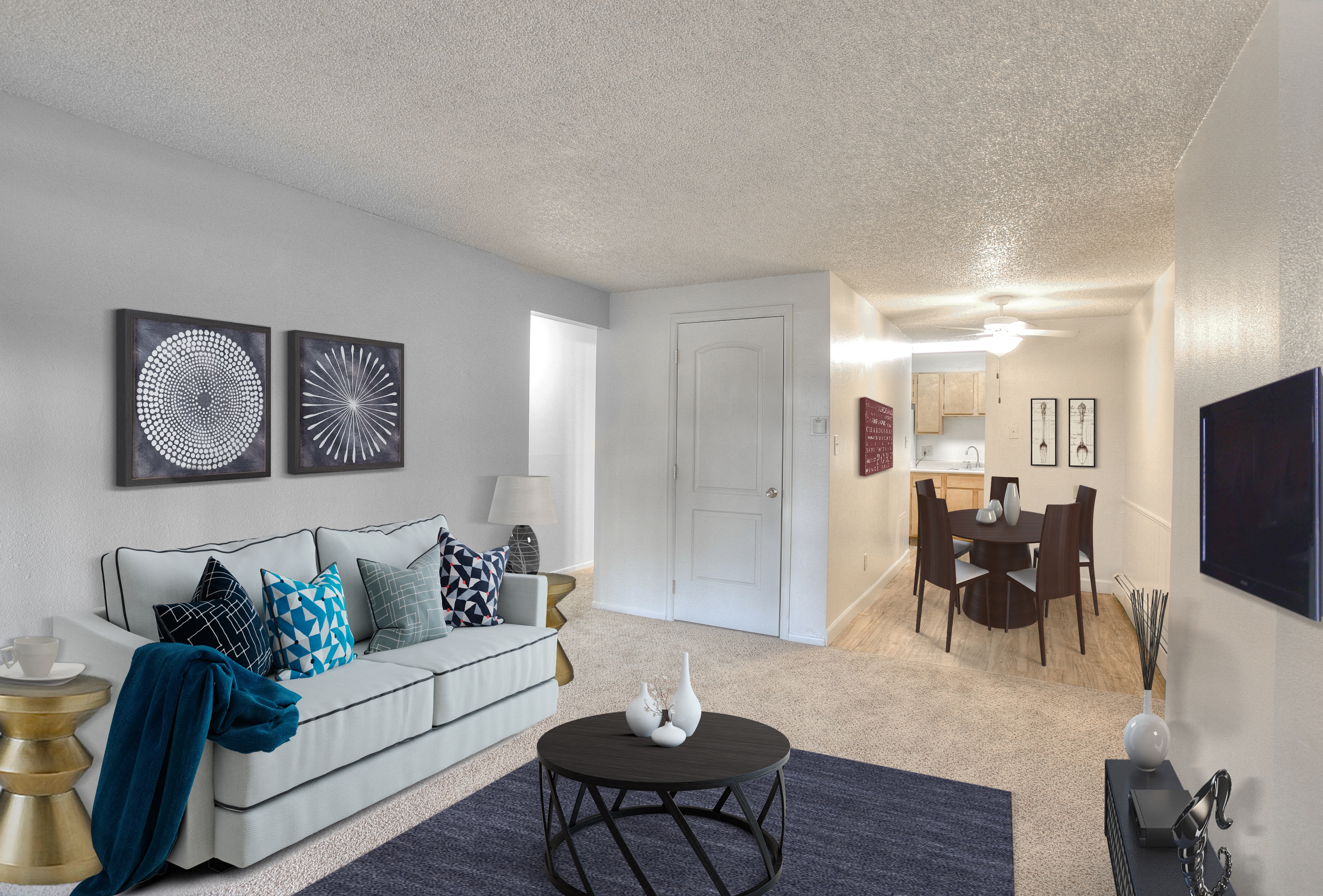 Living and dining room in Village on Plum apartment