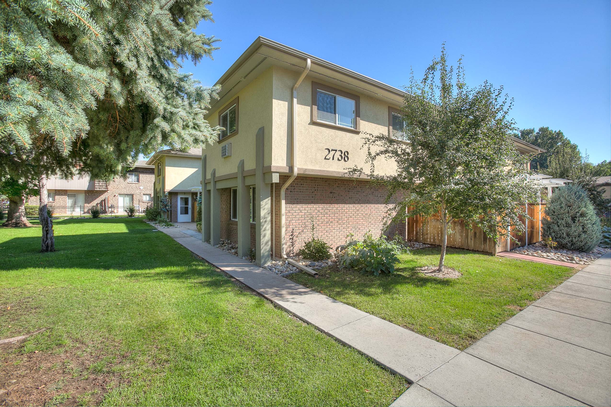 Village on Leisure exterior showing sidewalks into the property