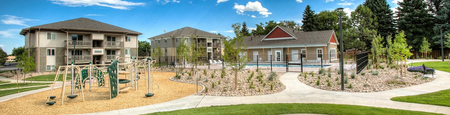 Playground, clubhouse, and pool at Village on Plum