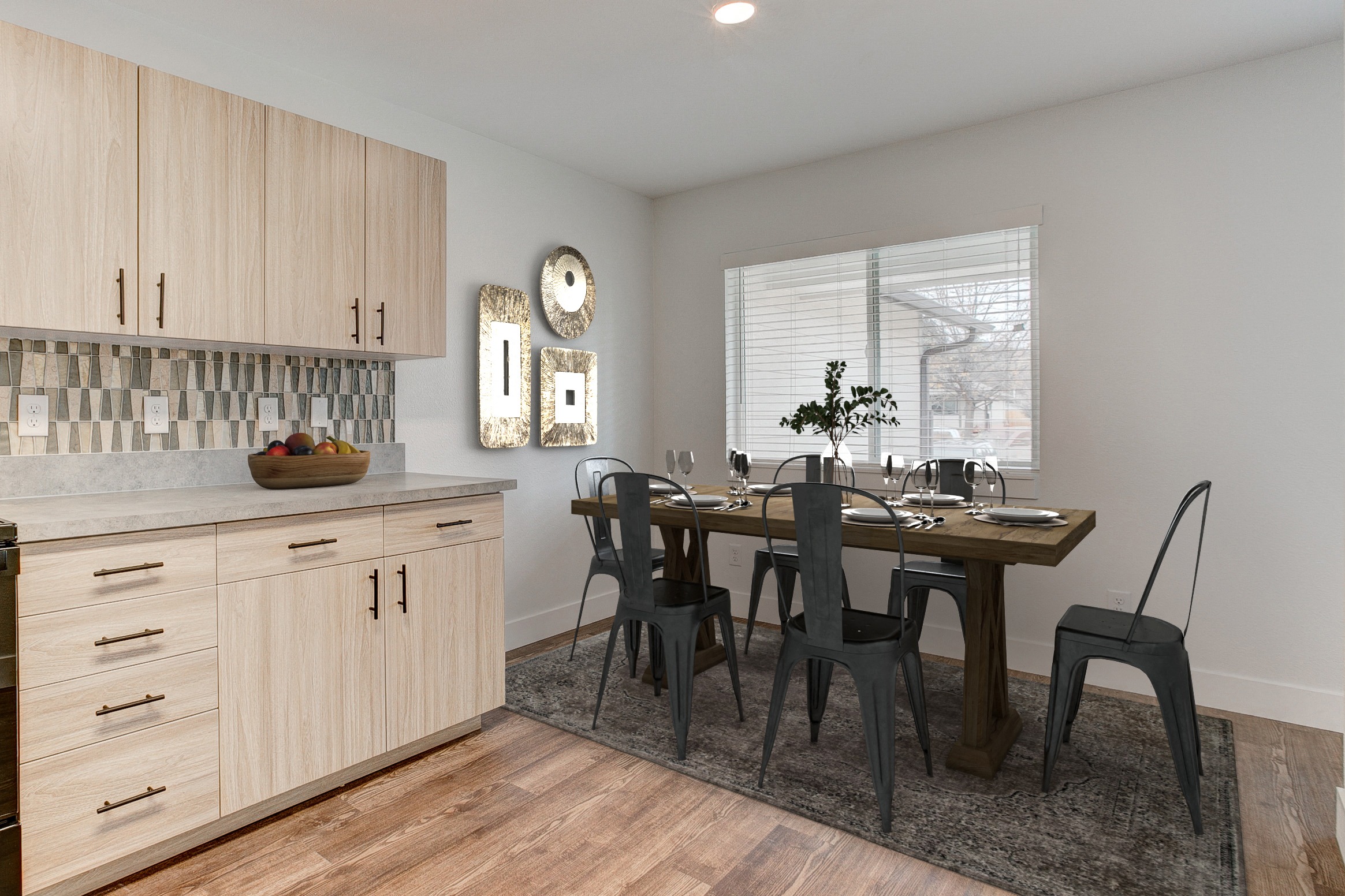 A dining room with a table set for four.
