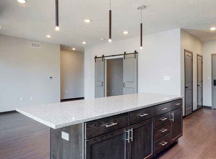 Beautiful kitchen island which provides plenty of extra storage with the additional cabinet space provided at Haven at Uptown in Lincoln, NE